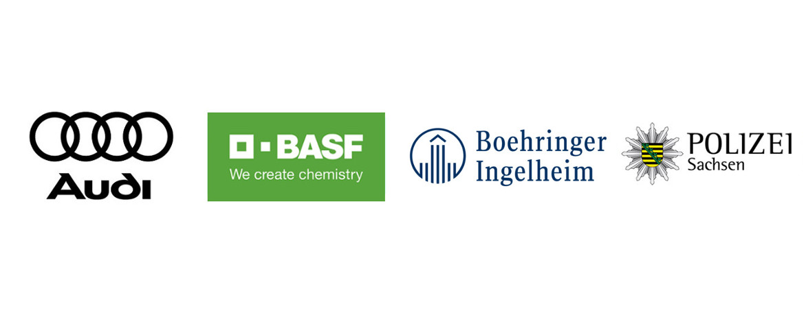 Logos von Audi, BASF, Lufthansa und randstad
