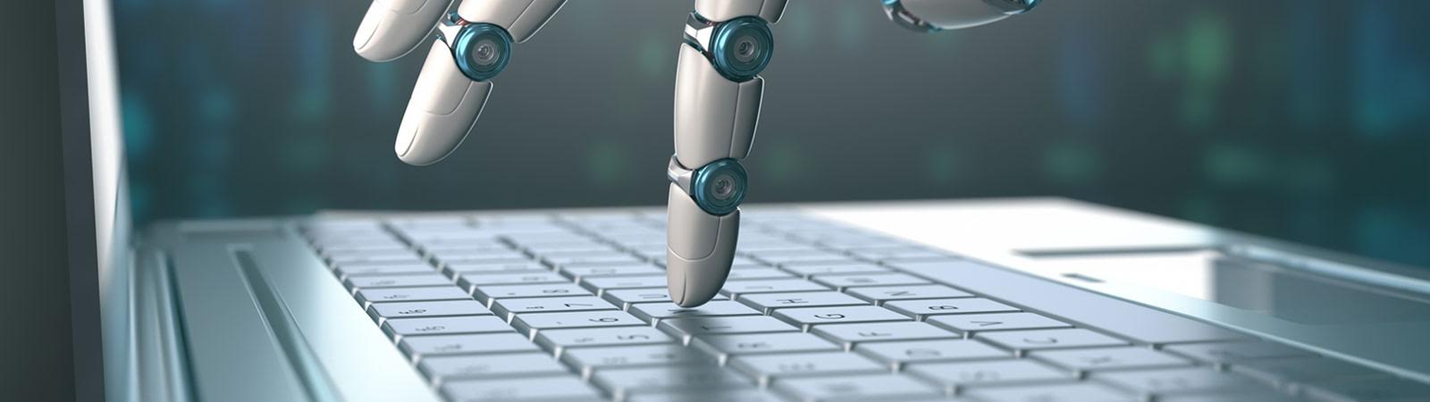 Roboterfinger tippt auf Tastatur